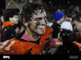 Raceland's Kane Snyder celebrates winning the Class A Russell  Athletic/KHSAA Commonwealth Gridiron Bowl Region 4 final in Raceland, Ky.  Friday Nov. 22, 2013 Raceland won 14-3. (AP Photo/The Independent, Kevin  Goldy Stock