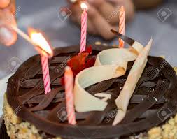 Birthday Party With Homemade Cake And Candles And Lighting The Stock Photo Picture And Royalty Free Image Image 87733687
