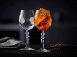 Prepare, serve and enjoy the perfect orange aperitif. Aperol Cocktail Glasses 2pcs 530ml Lyngby Alkemist Dailytable