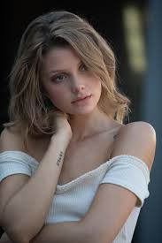 For some reason, models often like to show their tush in shots.