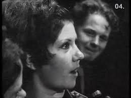 In a little café, just the other side of the border She was a-sitting there  a-givin' me Looks that made my mouth water