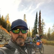 What is an intermediate or easy unpaved route between WA-410 and Ellensburg?