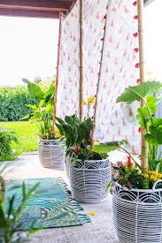 Surround your house with hedges or build a living fence Budget Friendly Diy Outdoor Privacy Screen What We Re Loving Design Trends Home Decor And Entertaining Hgtv