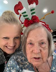 Peyton Reynolds plays christmas carols at assisted living home