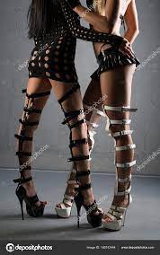 Two girls in bdsm high heel shoes cropped shot Stock Photo by ©Wisky  185743444