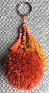 Bijou De Sac Porte Cles Pompons Grigri Orangeade Fait Etsy Pom Pom Handmade Etsy