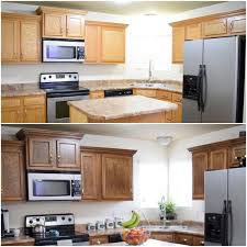 How To Refinish Wood Cabinets The Easy Way Restaining Kitchen Cabinets Builder Grade Kitchen Refinishing Cabinets