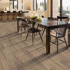 Quickstep Studio Spill Repel Hawthorne Oak 7 48 In W X 47 24 In L Water Resistant Embossed Wood Plank Laminate Flooring 19 63 Sq Ft Lowes Com Laminate Flooring Wood Planks Flooring