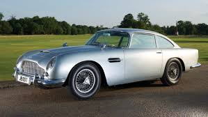 Aston Martin To Build 25 James Bond Db5 Replicas With All Of 007 S Toys Aston Martin Aston Martin Db5 Aston Martin Dbs