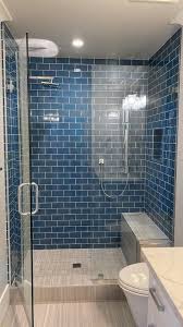 Glass mosaics will reflect light around the walls and ceiling, which in turn creates the illusion. Glacier Ocean Blue 3 Small Bathroom Renovations Small Bathroom Remodel Blue Bathroom Tile