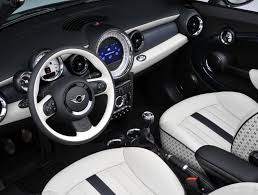 The Interior Of The 2 Millionth Mini A White Silver Metallic Mini Cabrio With Denim Blue Top I Need A Love Button Mini Cabrio Mini Cooper Interior Mini Cars
