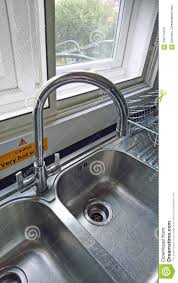 dual sink taps stock image. image of