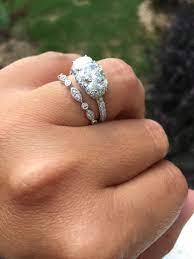 Ladies With Oval Three Stone Halo E Rings Show Me Your Wedding Bands Weddingbee Three Stone Engagement Rings Silver Wedding Bands Three Stone