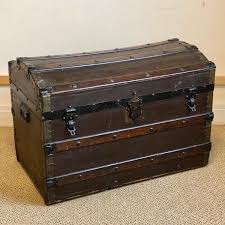 The piece is made from wood but also features additional metal accents for that unique look. Victorian Domed Steamer Trunk Antique Chests Coffers Hemswell Antique Centres