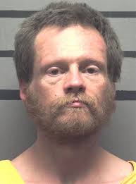 Murder suspect arraigned