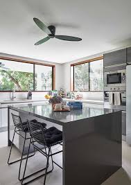 Environmentally friendly modern tropical house in singapore the integration between inside and outside is a key theme and function of this tropical house on sentosa island, singapore. Bask In The Warmth Of This Family S Modern Tropical Home Bluprint