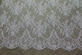 Chantilly lace is a cool white, which will go well with your blue couch, but it will also go well with your brown dining table and cream chairs. Buy Fabric Online Chantilly Lace Ivory Double Scallop Chantilly Lace Lace Bridal Lace French Lace Ivory Floral Scroll Vintage Lace Antique Lace Fabric Samples Available Worldwide Shipping