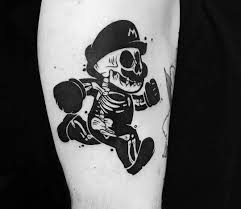 Photo Super Mario Tattoo By Roy Tsour Photo 25940 Super Mario Tattoo Mario Tattoo Black Tattoos