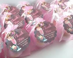 Choose from candles in carriage or bottle shapes, personalized candy bar wrappers, gourmet cookies and cookie cutters, place card holders and frames and even crystal pacifiers. Shower Favors Baby Shower Favors Spaglo Bath Bomb Favors Etsy Etsy Bridal Shower Personalized Baby Shower Favors Bridal Shower Party Favors