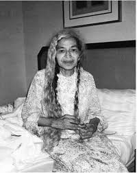 a rare photo of rosa parks taking her hair down before turning in for the night black history facts african american history women in history