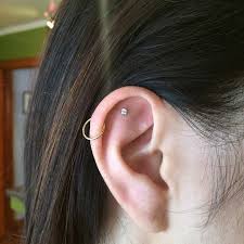l a s 10 coolest ear piercing combinations the man behind them all cool ear piercings ear piercing combinations multiple ear piercing