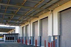 7 x electric roller shutters with special finish. About Us Mercia Industrial Door