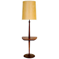 Some lamps with tables will have a style that is like an end table with a lamp attached. Danish Walnut Floor Lamp With Table Chairish
