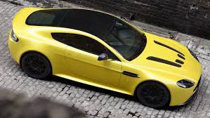 Image result for Sunburst Yellow 2017 Aston Martin