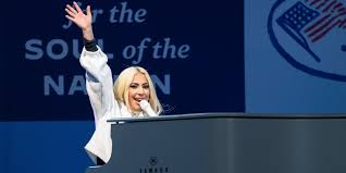 Netizens immediately likened the pin to the iconic 'mockingjay' of hunger games fame. Lady Gaga Will Sing The National Anthem At Biden Harris Inauguration Pitchfork