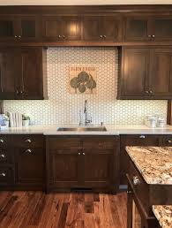 Backsplash Trends Great Contrast In This Kitchen Warm Brown Cabinets Rustic Wood Flo Dark Wood Kitchen Cabinets Backsplash With Dark Cabinets Brown Cabinets