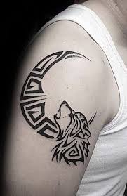 25 Wild Wolf Tattoos For Men Tribal Wolf Tattoo Wolf And Moon Tattoo Wolf Tattoo Design