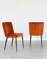 Well you're in luck, because here they come. Serena Rust Velvet Dining Chair Danetti
