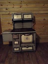 Many people continue to be drawn to the crackle of the wood or the deep penetrating warmth. Home Comfort Antique Primitive Amish Wood Cook Stove With Original Cook Book 800 00 Picclick