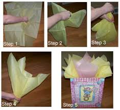 Pull out some newspaper and an old cereal box from your recycle bin to make these adorable little gift bags for next to nothing. How To Place Tissue Paper In A Gift Bag And Make It Look Good Holidappy