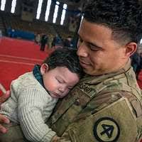 U.S. Army Command Sgt. Maj. Timothy Dotson, the outgoing command sergeant  major for the 1st Battalion, 17th Infantry Regiment, 2nd Stryker Brigade  Combat Team, 2nd Infantry Division, speaks during the change of