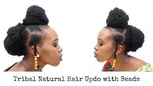 Updo hairstyles are perfect for formal occasions, like a wedding or a prom, which require a hairstyle that is elegant, works with your dress and accessories, and suits your personal attributes perfectly. Tribal Natural Hair Updo With Beads Tuke S Quest