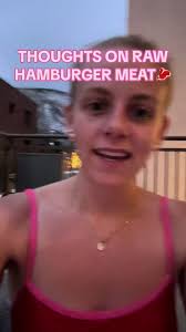 Woman Eating Raw Hamburger Meat