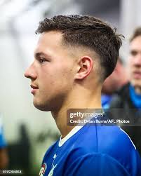 Debutant Cooper Harvey of the Kangaroos is seen during the 2023 AFL... News  Photo