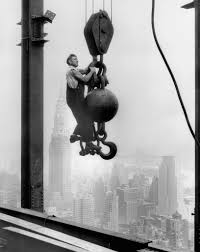 An Empire State builder hanging on a crane above New York City, 1930. [1632  × 2048] : rHistoryPorn