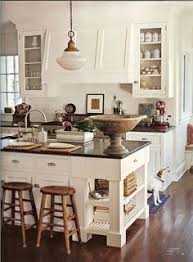 The lounging area holds a fireplace, map of the world, chairs, and couches in every dorm. 170 Kitchen Islands Ideas Kitchen Inspirations Kitchen Kitchen Design