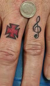 Firefighter maltese cross tattoo design. Maltese Cross And Musical Note Tattoo Tattooimages Biz