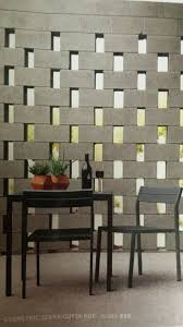 Parging is a way of covering up a cinder block wall that is similar to applying stucco. Open Cinder Block Wall Created By Staggering The Blocks From The Design Within Reach Catalog Cinder Block Walls Concrete Block Walls Breeze Block Wall