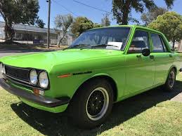 Image result for Jade Green 1959 Datsun