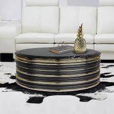 The tulou coffee table is a stylish way to maximize space when you're decorating a small area. Designer Gold Plated Round Marble Coffee Table Juliettes Interiors