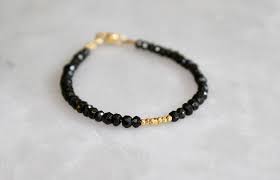 Black And Gold Bracelet Meaning Now Available With Sterling Silver Or Gold This Black Tourmaline Bracelet Is Both Elegant And Classic In Its Simplistic Black And Gold De Black Tourmaline Jewelry Black Tourmaline Tourmaline Jewelry