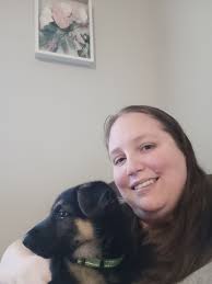 Skiing with dog in backcountry winter terrain