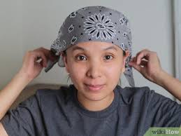 To start, secure hair with a pony tail. 4 Ways To Tie A Bandana Wikihow