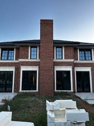 Why is this couple building a Georgian style house in the middle of  Canberra?