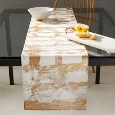Set your table with table runners in classic colors and bright patterns. Metallic Abstract Grid Table Runner Table Runners West Elm Tables Table Linens