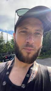 Wheelchair Man Pulled by Lawnmower